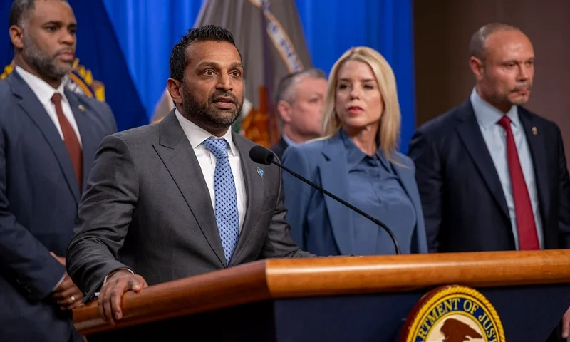 FBI Director Kash Patel (2L) speaks alongside Attorney General Pam Bondi (C) and Deputy FBI Director Dan Bongino (R) during a news conference at the Department of Justice to discuss the arrest of man in connection with pipe bombs placed near the Democratic and Republican party headquarters on the eve of the January 6, 2021 US Capitol riot, in Washington, DC, on December 4, 2025. (Photo by DANIEL HEUER / AFP via Getty Images)