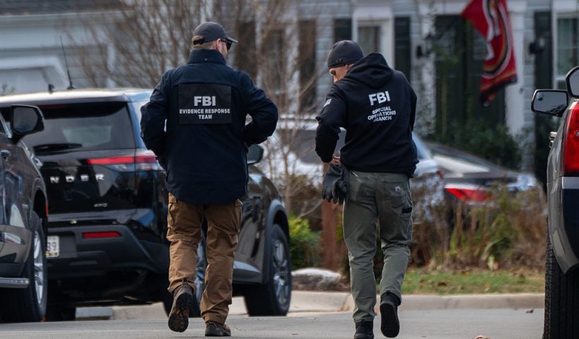WOODBRIDGE, VIRGINIA - DECEMBER 4: FBI agents gather in front of the home of suspected January 6th, 2021 pipe bomber on December 4, 2025 in Woodbridge, Virginia. Federal agents have arrested a suspect identified as Brian Cole they are alleging placed two pipe bombs, which never exploded, the night before the January 6th, 2021 U.S. Capitol attack. (Photo by Andrew Leyden/Getty Images)