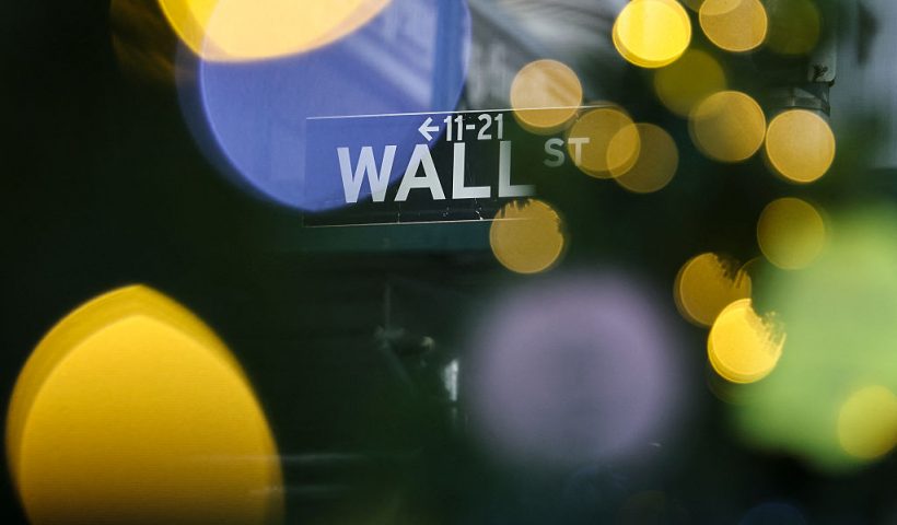 TOPSHOT - A view of the New York Stock Exchange (NYSE) and Christmas tree on December 5, 2025 in New York City. (Photo by ANGELA WEISS / AFP via Getty Images)