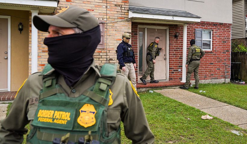 NEW ORLEANS, LOUISIANA - DECEMBER 6: U.S. Chief Border Patrol Agent, Gregory Bovino knocks on a door of a suspected undocumented immigrant while conducting an immigration enforcement operation in a neighborhood on December 6, 2025 in Kenner, Louisiana. Federal agents are conducting 'Operation Catahoula Crunch,' launched by the Department of Homeland Security as a part of an immigration crackdown on undocumented immigrants in the United States. Photo by Ryan Murphy/Getty Images)