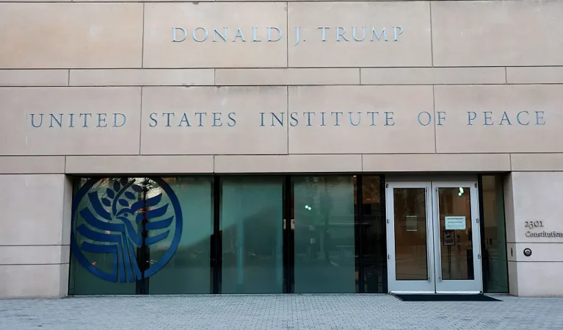 WASHINGTON, DC - DECEMBER 03: U.S. President Donald Trump's name is seen recently placed on the outside of the United States Institute of Peace (USIP) building headquarters on December 03, 2025 in Washington, DC. This addition was made ahead of the Trump administration hosting a deal-signing between the leaders of Rwanda and the Democratic Republic of Congo. (Photo by Anna Moneymaker/Getty Images)