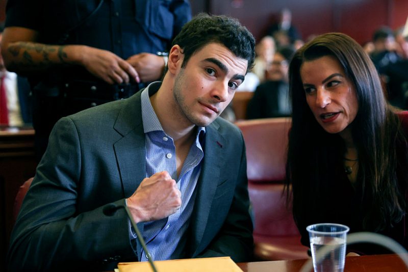 Mangione confidently ‘fist pumps’ as defense team challenges admissibility of evidence from arrest