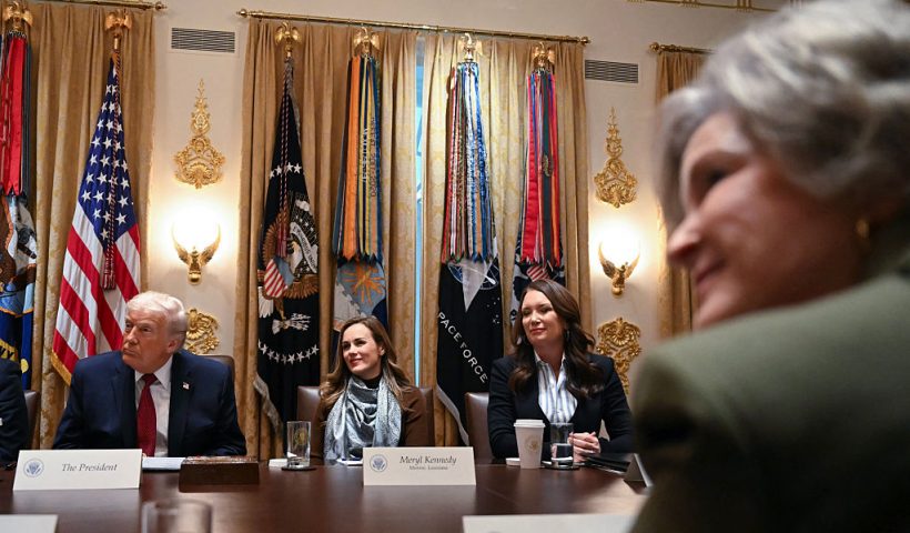 (L-R) US President Donald Trump, Meryl Kennedy, CEO of 4Sisters Rice, US Secretary of Agriculture Brooke Rollins and White House Chief of Staff Susie Wiles look on during a roundtable event to discuss aid for farmers, in the Cabinet Room of the White House in Washington, DC, on December 8, 2025. President Trump is announcing a $12 billion aid package for US farmers, targeting a key support base hit by his trade policies. Since Trump's return to the White House in January, many US farmers have been battered by impacts of his wide-ranging tariffs, including retaliatory measures from trading partners. (Photo by ANDREW CABALLERO-REYNOLDS / AFP via Getty Images)