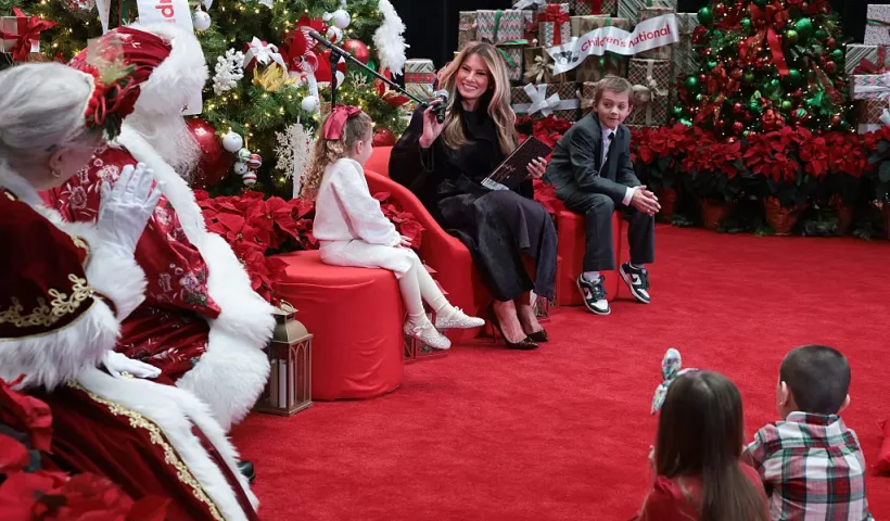 WASHINGTON, DC - DECEMBER 05: First lady Melania Trump visits with patients and their families at Children’s National Hospital on December 5, 2025 in Washington, DC. The first lady visited the hospital to celebrate the winter holiday season and read children’s books to patients. (Photo by Anna Moneymaker/Getty Images)