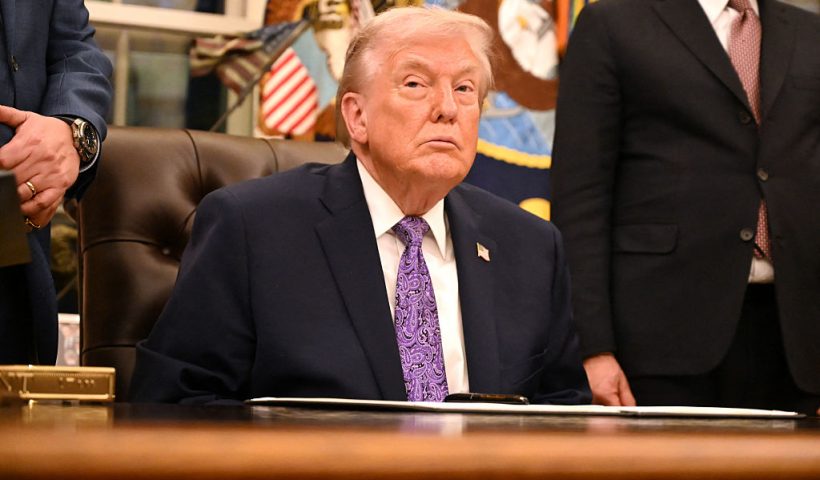 US President Donald Trump looks on during a signing ceremony on AI the Oval Office of the White House in Washington, DC, on December 11, 2025. (Photo by Alex WROBLEWSKI / AFP via Getty Images)