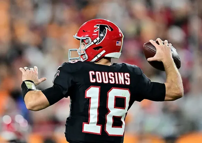 Kirk Cousins #18 of the Atlanta Falcons throws a pass against the Tampa Bay Buccaneers during the fourth quarter at Raymond James Stadium on December 11, 2025 in Tampa, Florida. (Photo by Julio Aguilar/Getty Images)