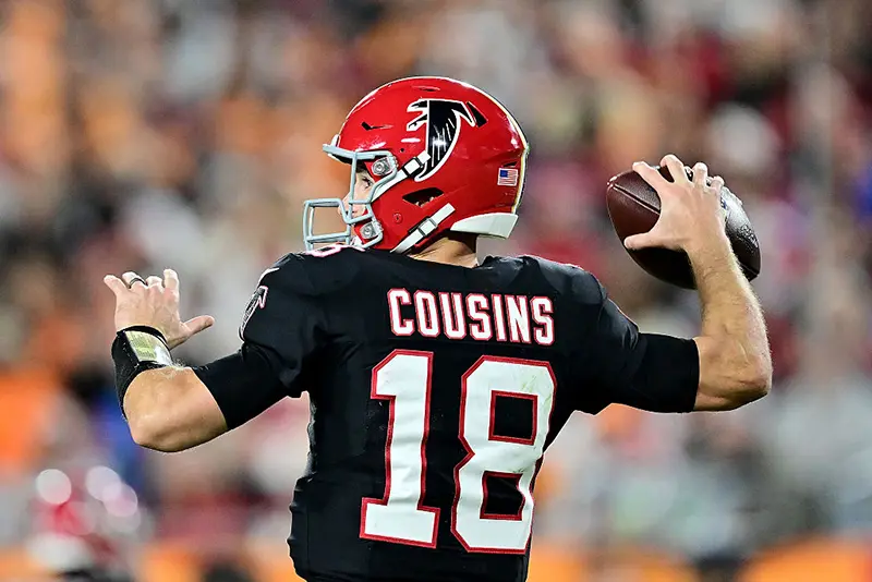 Kirk Cousins #18 of the Atlanta Falcons throws a pass against the Tampa Bay Buccaneers during the fourth quarter at Raymond James Stadium on December 11, 2025 in Tampa, Florida. (Photo by Julio Aguilar/Getty Images)