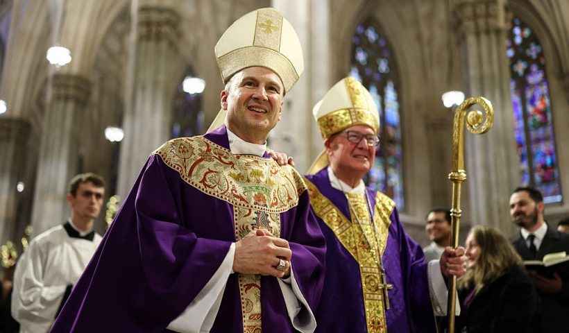Cardinal Timothy Dolan (R) and his successor Ronald Hicks arrive to lead a mass at St. Patrick's Cathedral in the Manhattan borough of New York City on December 18, 2025. Pope Leo XIV has accepted the resignation of New York's conservative Archbishop Timothy Dolan and named a little-known, pro-migrant bishop from his native Chicago to replace him, the Vatican said on December 18. (Photo by CHARLY TRIBALLEAU / AFP via Getty Images)