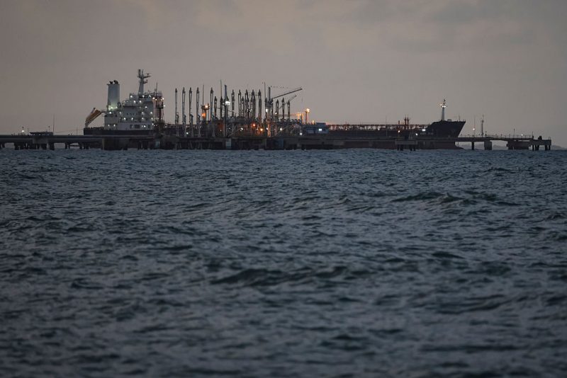 PUERTO CABELLO, VENEZUELA - DECEMBER 18: An oil tanker remains anchored at the dock during a walk around the outskirts of the 'El Palito' refinery on December 18, 2025 in Puerto Cabello, Venezuela. President Trump stated on December 17th that Venezuela took away oil rights from the US. Trump's administration has sanctioned Venezuelan oil with blockades, while many US Navy units are deployed off the coast of Venezuela under the premise of combating the drug cartels. (Photo by Jesus Vargas/Getty Images)