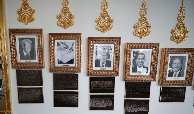 WASHINGTON, DC - DECEMBER 17: Newly installed plaques summarizing the legacies as interpreted by the Trump White House of former U.S. Presidents Joe Biden, Donald Trump, Barack Obama, and George W. Bush are shown along the colonnade, or the “Presidential Walk of Fame”, December 17, 2025 in Washington, DC. The colonnade lines the north side of the Rose Garden, which has been recently been partially covered with paving stones. (Photo by Win McNamee/Getty Images)