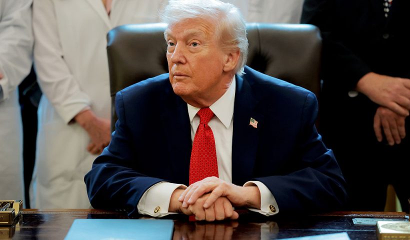 WASHINGTON, DC - DECEMBER 18: U.S. President Donald Trump speaks to journalists after signing an executive order in the Oval Office of the White House on December 18, 2025 in Washington, DC. (Photo by Anna Moneymaker/Getty Images)