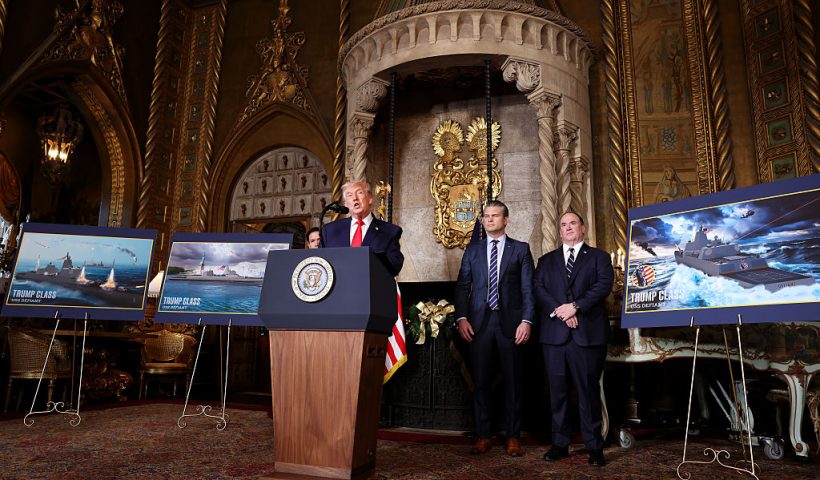 PALM BEACH, FLORIDA - DECEMBER 22: U.S. President Donald Trump, joined by Secretary of State Marco Rubio (L), Secretary of War Pete Hegseth, and Secretary of the Navy John Phelan, announced the creation of the “Trump-class” battleship during a statement to the media at Trump’s Mar-a-Lago estate on December 22, 2025 in Palm Beach, Florida. Trump announced the new class of ship will become the centerpiece of his “Golden Fleet” program to rebuild and strengthen the U.S. shipbuilding industry. (Photo by Tasos Katopodis/Getty Images)