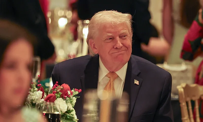 PALM BEACH, FLORIDA - DECEMBER 24: U.S. President Donald Trump attends a Christmas Eve Dinner At Mar-a-Lago on December 24, 2025 in Palm Beach, Florida. Trump is spending the holidays in Florida this year. (Photo by Tasos Katopodis/Getty Images)
