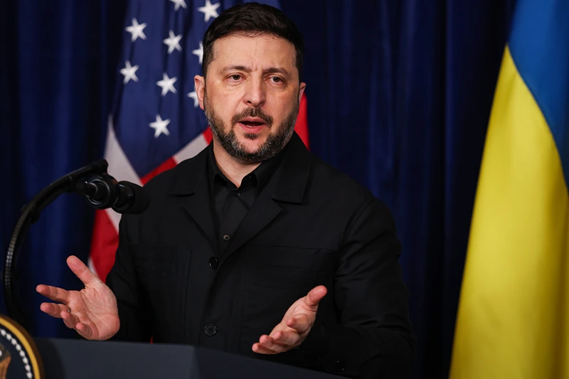 PALM BEACH, FLORIDA - DECEMBER 28: Ukrainian President Volodymyr Zelensky speaks during a news conference with U.S. President Donald Trump following their meeting at Trump’s Mar-a-Lago club on December 28, 2025 in Palm Beach, Florida. Trump invited Zelensky to his private club to work on the U.S.-proposed peace plan to end the war in Ukraine as the conflict approaches four years since the sudden full-scale invasion by Russia on February 24, 2022. (Photo by Joe Raedle/Getty Images)