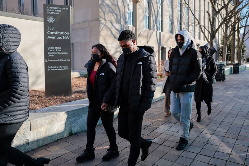 WASHINGTON, DC - DECEMBER 30: Brian Cole Jr.'s family exit the E. Barrett Prettyman United States Courthouse on December 30, 2025 in Washington, DC. Alleged January 6 pipe bomb suspect Brian Cole Jr. appeared for a hearing on charges of transporting an explosive device in interstate commerce with intent to kill, injure or intimidate individuals or unlawfully damage or destroy property. (Photo by Heather Diehl/Getty Images)