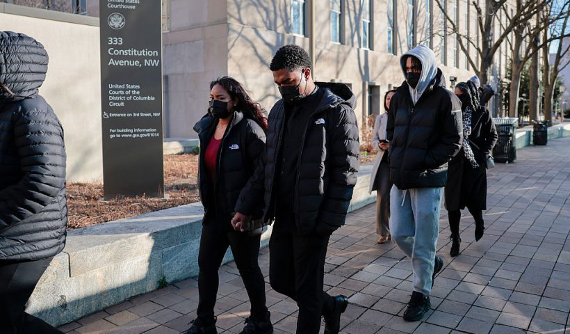 WASHINGTON, DC - DECEMBER 30: Brian Cole Jr.'s family exit the E. Barrett Prettyman United States Courthouse on December 30, 2025 in Washington, DC. Alleged January 6 pipe bomb suspect Brian Cole Jr. appeared for a hearing on charges of transporting an explosive device in interstate commerce with intent to kill, injure or intimidate individuals or unlawfully damage or destroy property. (Photo by Heather Diehl/Getty Images)