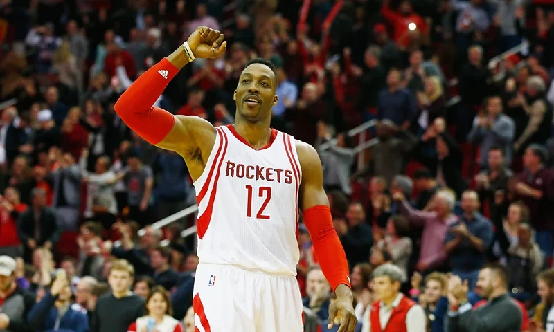 HOUSTON, TX - JANUARY 10: Dwight Howard #12 of the Houston Rockets celebrates after the Rockets defeated the Indiana Pacers 107-103 in overtime during their game at the Toyota Center on January 10, 2016 in Houston, Texas. NOTE TO USER: User expressly acknowledges and agrees that, by downloading and or using this Photograph, user is consenting to the terms and conditions of the Getty Images License Agreement. (Photo by Scott Halleran/Getty Images)
