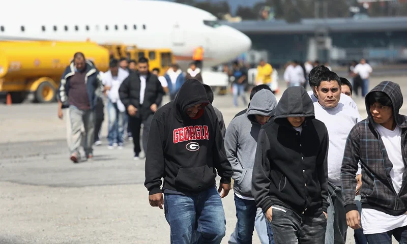 GUATEMALA CITY, GUATEMALA - FEBRUARY 09: Guatemalan immigrants deported from the United States arrive on a ICE deportation flight on February 9, 2017 in Guatemala City, Guatemala. The charter jet, carrying 135 deportees, arrived from Texas, where U.S. border agents catch the largest number illigal immigrants crossing into the United States, many of them from Central America. U.S. President Donald Trump pledged to vastly increase the number of deportations. (Photo by John Moore/Getty Images)