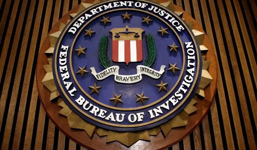 WASHINGTON - MARCH 09: The seal of the F.B.I. hangs in the Flag Room at the bureau's headquaters March 9, 2007 in Washington, DC. F.B.I. Director Robert Mueller was responding to a report by the Justice Department inspector general that concluded the FBI had committed 22 violations in its collection of information through the use of national security letters. The letters, which the audit numbered at 47,000 in 2005, allow the agency to collect information like telephone, banking and e-mail records without a judicially approved subpoena. (Photo by Chip Somodevilla/Getty Images)