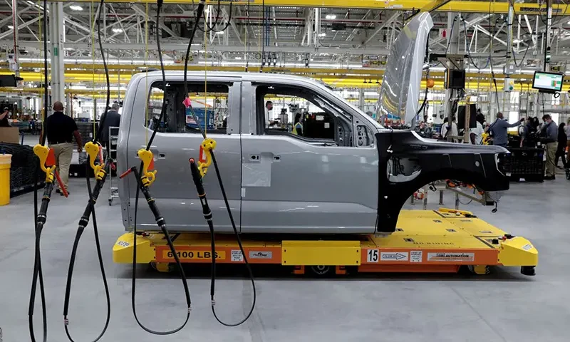 The cab to a Ford all-electric F-150 Lightning truck prototype is seen on an automated guided vehicle (AGV) at the Rouge Electric Vehicle Center in Dearborn, Michigan, U.S. September 16, 2021. REUTERS/Rebecca Cook/File Photo