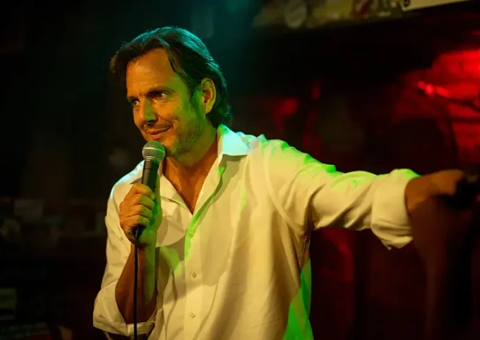 This image released by Searchlight Pictures shows Will Arnett in a scene from “Is This Thing On?” (Jason McDonald/Searchlight Pictures via AP)