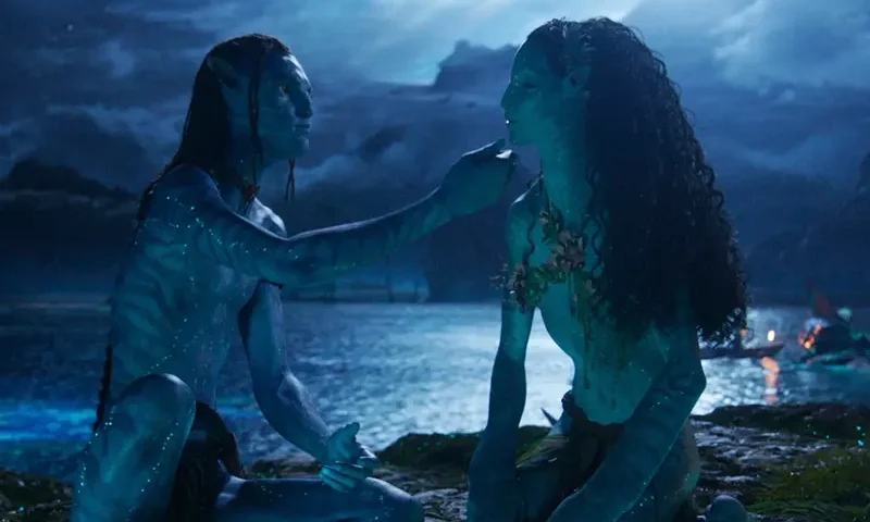 Lo’ak, performed by Britain Dalton, left, and Tsireya, performed by Bailey Bass in a scene from “Avatar: Fire and Ash.” (20th Century Studios/Disney via AP)