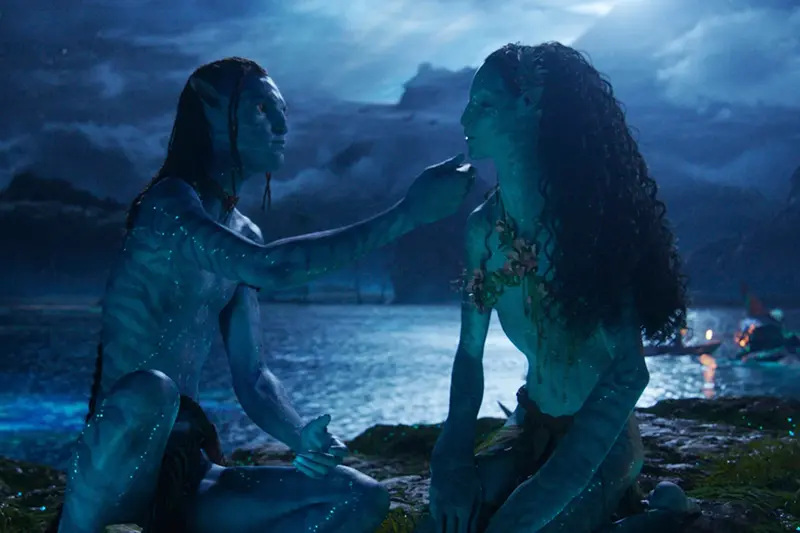 Lo’ak, performed by Britain Dalton, left, and Tsireya, performed by Bailey Bass in a scene from “Avatar: Fire and Ash.” (20th Century Studios/Disney via AP)