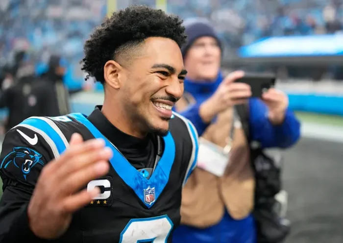 Carolina Panthers quarterback Bryce Young celebrates after an NFL football game between the Carolina Panthers and the Los Angeles Rams, Sunday, Nov. 30, 2025, in Charlotte, N.C. (AP Photo/Jacob Kupferman)