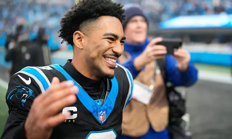 Carolina Panthers quarterback Bryce Young celebrates after an NFL football game between the Carolina Panthers and the Los Angeles Rams, Sunday, Nov. 30, 2025, in Charlotte, N.C. (AP Photo/Jacob Kupferman)