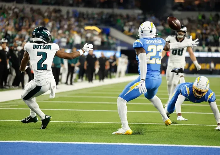 Los Angeles Chargers safety Tony Jefferson (23) intercepts a pass intended for Philadelphia Eagles wide receiver Jahan Dotson (2) during overtime of an NFL football game Monday, Dec. 8, 2025, in Inglewood, Calif. (AP Photo/Caroline Brehman)