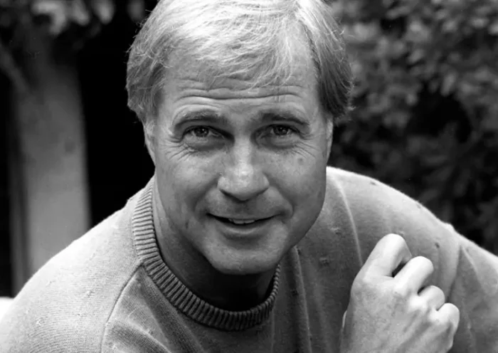 Actor Gil Gerard poses in Los Angeles, Ca. on July 16, 1990. (AP Photo/Reed Saxon, File)