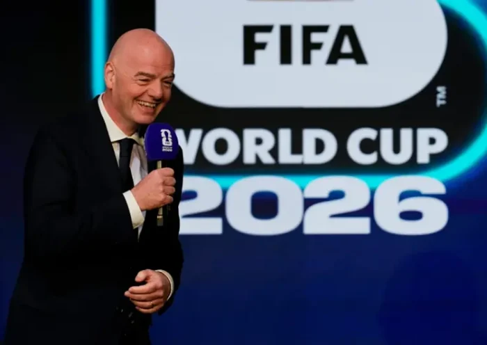 FIFA President Gianni Infantino speaks during the match schedule reveal for the 2026 soccer World Cup in Washington, Saturday, Dec. 6, 2025. (AP Photo/Chris Carlson)