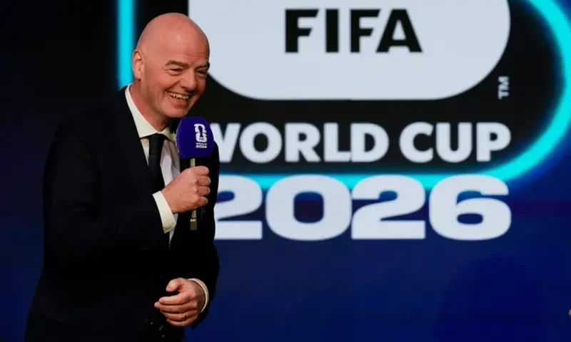 FIFA President Gianni Infantino speaks during the match schedule reveal for the 2026 soccer World Cup in Washington, Saturday, Dec. 6, 2025. (AP Photo/Chris Carlson)