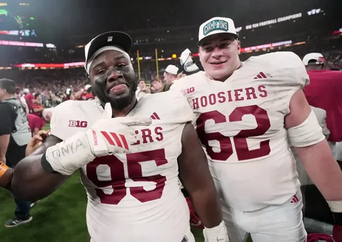 Indiana’s Tyrique Tucker and Drew Evans celebrate after the Big Ten championship NCAA college football game against Ohio State in Indianapolis, Saturday, Dec. 6, 2025. (AP Photo/AJ Mast)