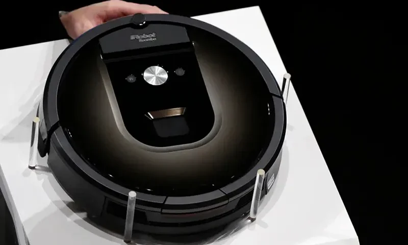 A Roomba 980 vacuum cleaning robot is presented during a presentation in Tokyo, on Sept. 29, 2015. (AP Photo/Eugene Hoshiko, File)