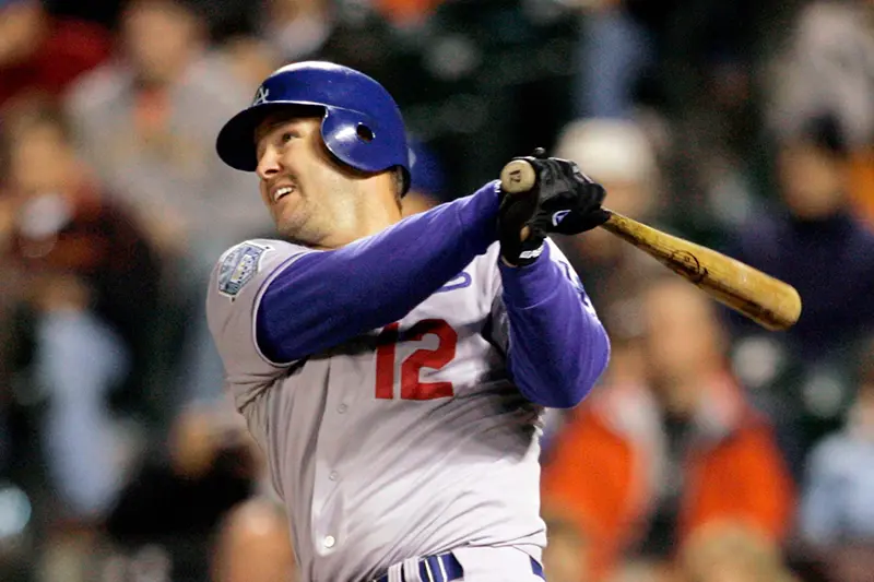 Los Angeles Dodgers Jeff Kent hits a two-run home run against the San Francisco Giants in the fourth inning of a baseball game in San Francisco, Sept. 26, 2008. (AP Photo/Jeff Chiu, File)