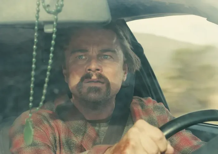 This image released by Warner Bros. Pictures shows Leonardo DiCaprio in a scene from “One Battle After Another.” (Warner Bros. Pictures via AP)