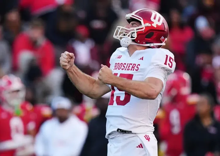 Indiana quarterback Fernando Mendoza (15) celebrates after throwing a touchdown pass to wide receiver Omar Cooper Jr. during the first half of an NCAA college football game against Maryland, Saturday, Nov. 1, 2025, in College Park, Md. (AP Photo/Stephanie Scarbrough, File)