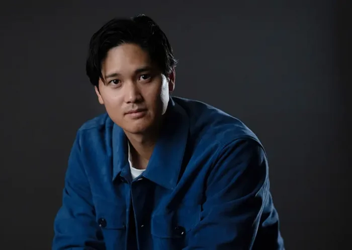 Los Angeles Dodgers’ Shohei Ohtani poses for photos after an interview with The Associated Press in Pasadena, Calif., Wednesday, Nov. 26, 2025. (AP Photo/Jae C. Hong)