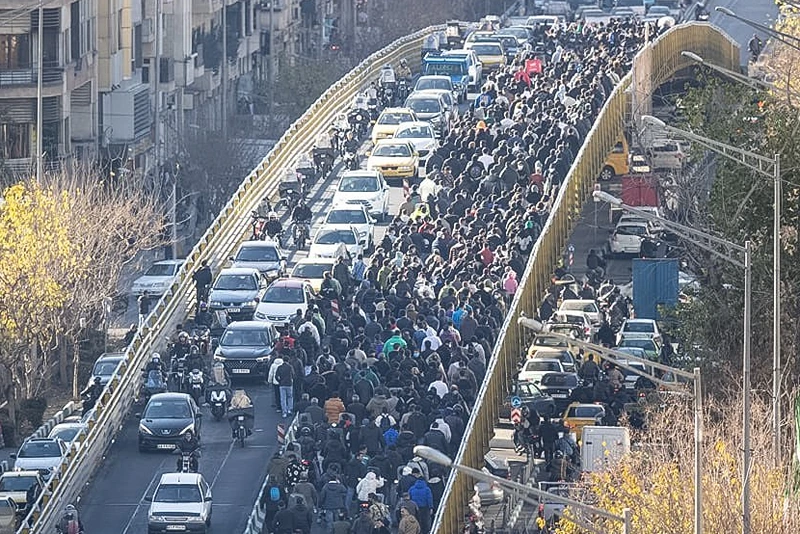 Thousands of Iranians gather to protest the nation's economic woes - via Fars News Agency