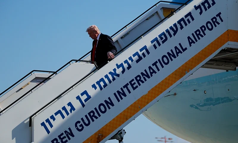 TEL AVIV, ISRAEL - OCTOBER 13: U.S. President Donald Trump disembarks from Air Force One as he arrives at Ben Gurion International Airport on October 13, 2025 in Tel Aviv, Israel. President Trump is visiting the country hours after Hamas released the remaining Israeli hostages captured on Oct. 7, 2023, part of a US-brokered ceasefire deal to end the war in Gaza. (Photo by Chip Somodevilla/Getty Images)