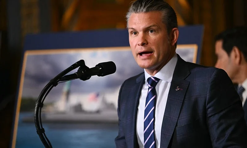 Defense Secretary Pete Hegseth speaks about the US Navy's new Golden Fleet initiative, unveiling a new class of warships, at Mar-a-Lago in Palm Beach, Florida, on December 22, 2025. President Donald Trump on December 22 announced a new class of heavily armed warships that will be named after himself -- an honor usually reserved for US leaders who have left office.Two of the Trump-class ships will be built initially but that number could grow substantially in the future, according to the president, who said they will be "some of the most lethal surface warfare ships" and "the largest battleship in the history of our country."Trump made the announcement at his Mar-a-Lago residence in Florida alongside Pentagon chief Pete Hegseth, Secretary of State Marco Rubio and Navy Secretary John Phelan, with images of the planned high-tech vessels on stands nearby. (Photo by ANDREW CABALLERO-REYNOLDS / AFP via Getty Images)