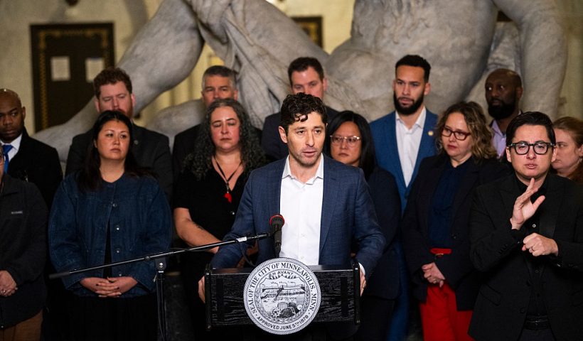 MINNEAPOLIS, MINNESOTA - JANUARY 09: Minneapolis Mayor Jacob Frey (C) speaks during a press conference at City Hall on January 09, 2026 in Minneapolis, Minnesota. Frey and local city officials are calling on federal investigators to turn over information to the Minnesota Bureau of Criminal Apprehension after the shooting death of Renee Good by a federal officer this week. (Photo by Stephen Maturen/Getty Images)