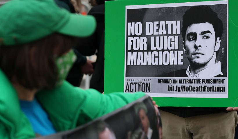 NEW YORK, NEW YORK - JANUARY 09: Supporters of Luigi Mangione wait in line to enter Manhattan Federal Court on January 09, 2026 in New York City. Lawyers for Mangione attorneys are in court for the 27-year-old accused killer to try to avoid the death penalty in the fatal shooting of Brian Thompson, UnitedHealthcare’s top executive in 2024. (Photo by Michael M. Santiago/Getty Images)