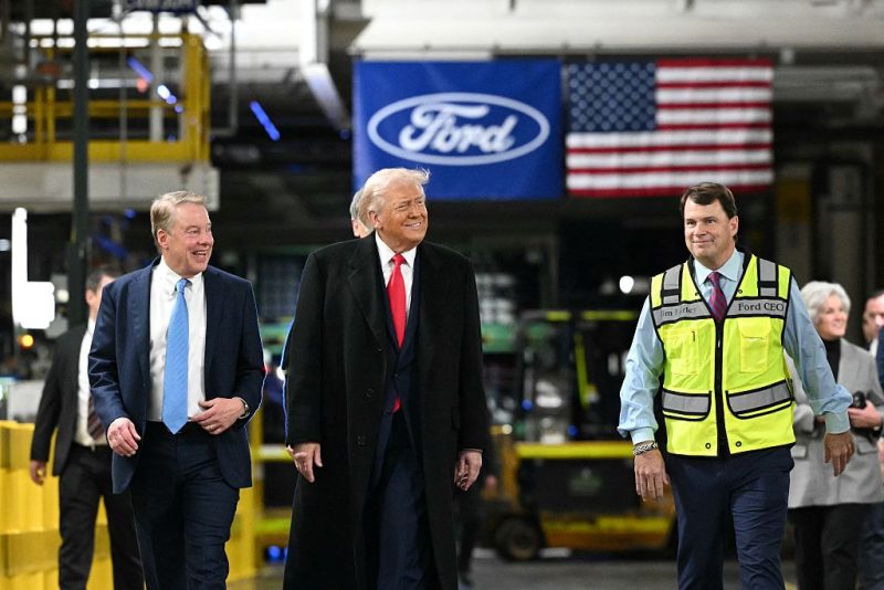 US President Donald Trump, alongside L/R Ford executive chairman Bill Fordand Ford CEO Jim Farley, tours Ford Motor Company's River Rouge complex in Dearborn, Michigan, on January 13, 2026. (Photo by Mandel NGAN / AFP via Getty Images)
