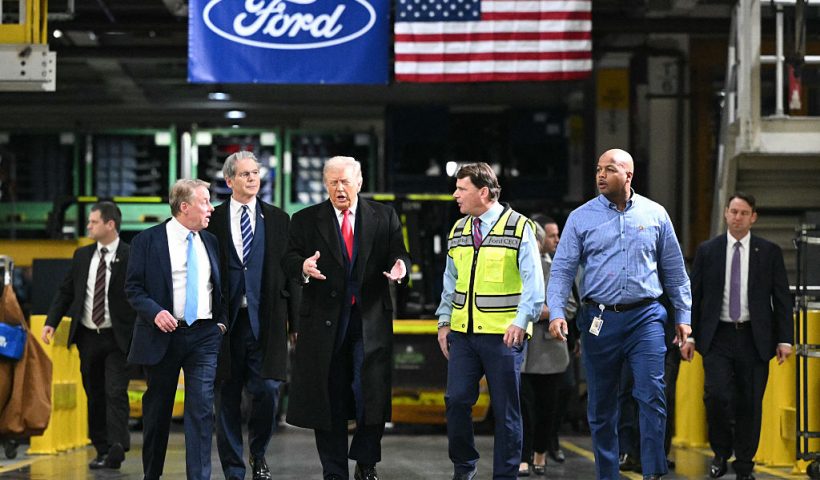 US President Donald Trump, alongside L/R Ford executive chairman Bill Ford, Secretary of Treasury Scott Bessent, Ford CEO Jim Farley, and plant manager Corey Williams, tours Ford Motor Company's River Rouge complex in Dearborn, Michigan on January 13, 2026. (Photo by Mandel NGAN / AFP via Getty Images)