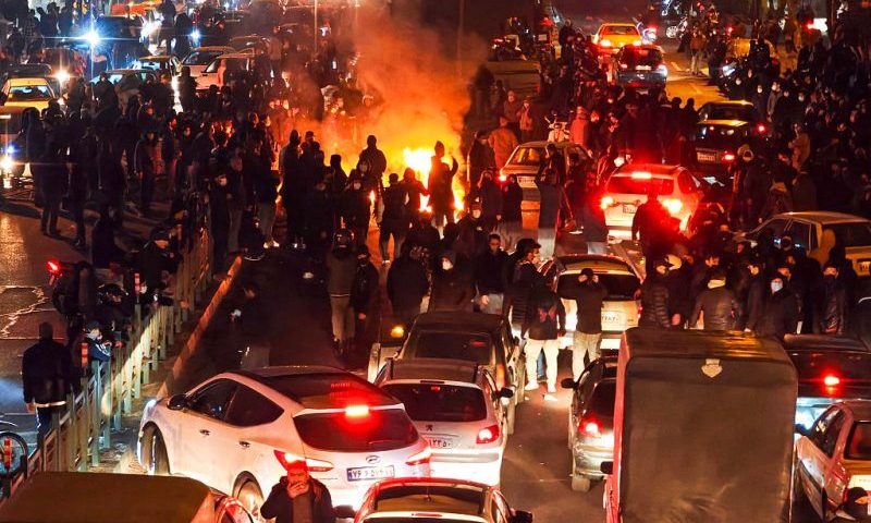 People gather during protest on January 8, 2026 in Tehran, Iran. Demonstrations have been ongoing since December, triggered by soaring inflation and the collapse of the rial, and have expanded into broader demands for political change. (Photo by Anonymous/Getty Images)