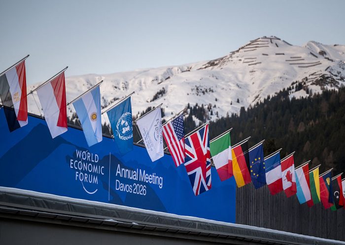 EDITORS NOTE: Graphic content / A sign of the World Economic Forum (WEF) is seen on the top of the Congress Centre that hosts the WEF annual meeting in the Alpine resort of Davos on its opening day in Davos on January 19, 2026. The World Economic Forum takes place in Davos from January 19 to January 23, 2026. (Photo by Fabrice COFFRINI / AFP via Getty Images)