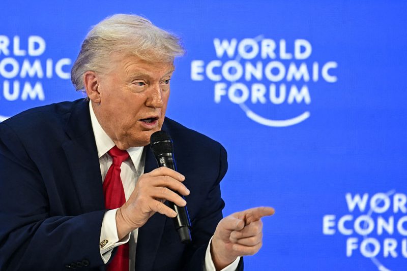 US President Donald Trump gestures as he speaks during the World Economic Forum (WEF) annual meeting in Davos on January 21, 2026. The World Economic Forum takes place in Davos from January 19 to January 23, 2026. (Photo by Fabrice COFFRINI / AFP via Getty Images)