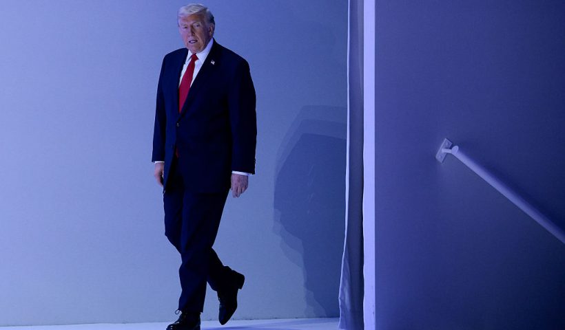 DAVOS, SWITZERLAND - JANUARY 21: U.S. President Donald Trump takes the stage before delivering a speech at the World Economic Forum (WEF) at the Davos Congress Center on January 21, 2026 in Davos, Switzerland. The annual meeting of political and business leaders comes amid rising tensions between the United States and Europe over a range of issues, including Trump's vow to acquire Greenland, a semi-autonomous Danish territory. (Photo by Chip Somodevilla/Getty Images)